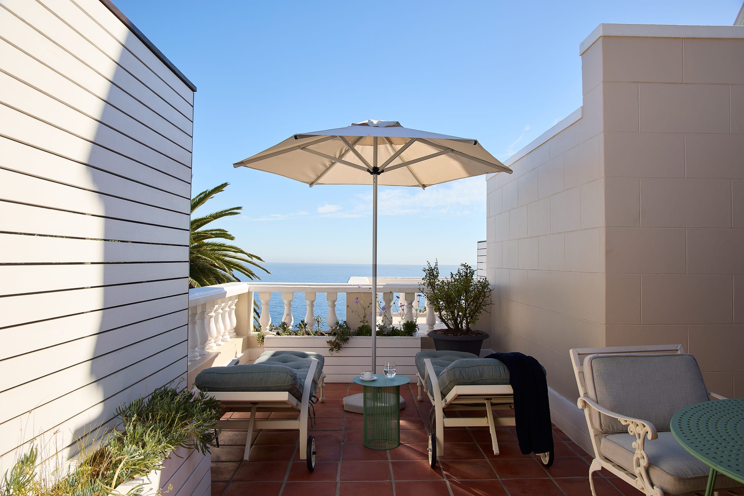 Private ocean-facing terrace of the Deluxe House Room