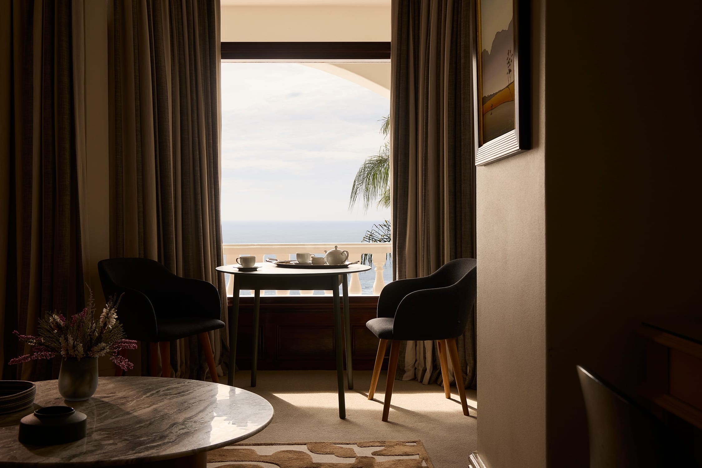 Seating area within the Deluxe House Room
