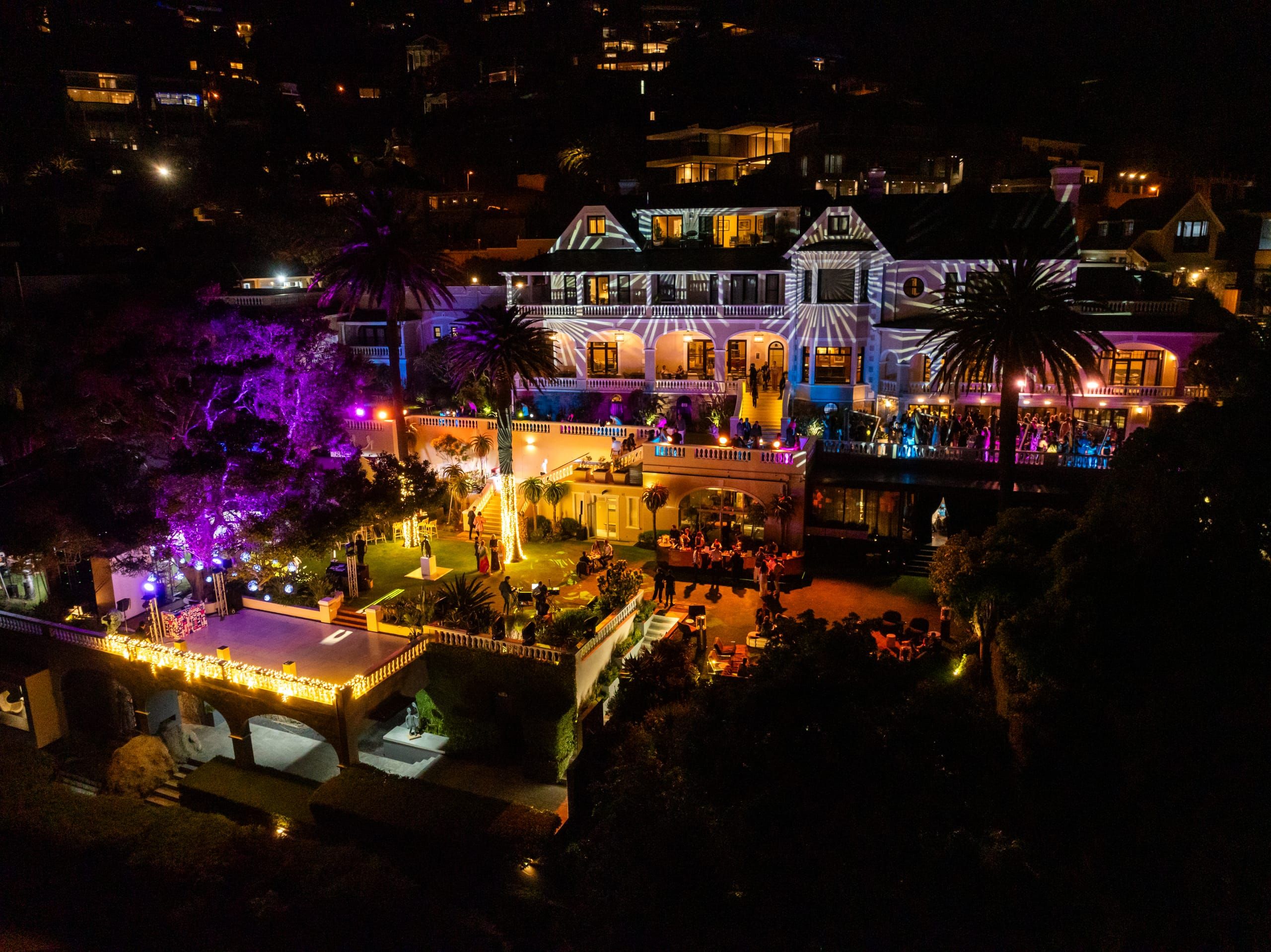 Ellerman House illuminated at night for the annual ArtAngels fundraising event