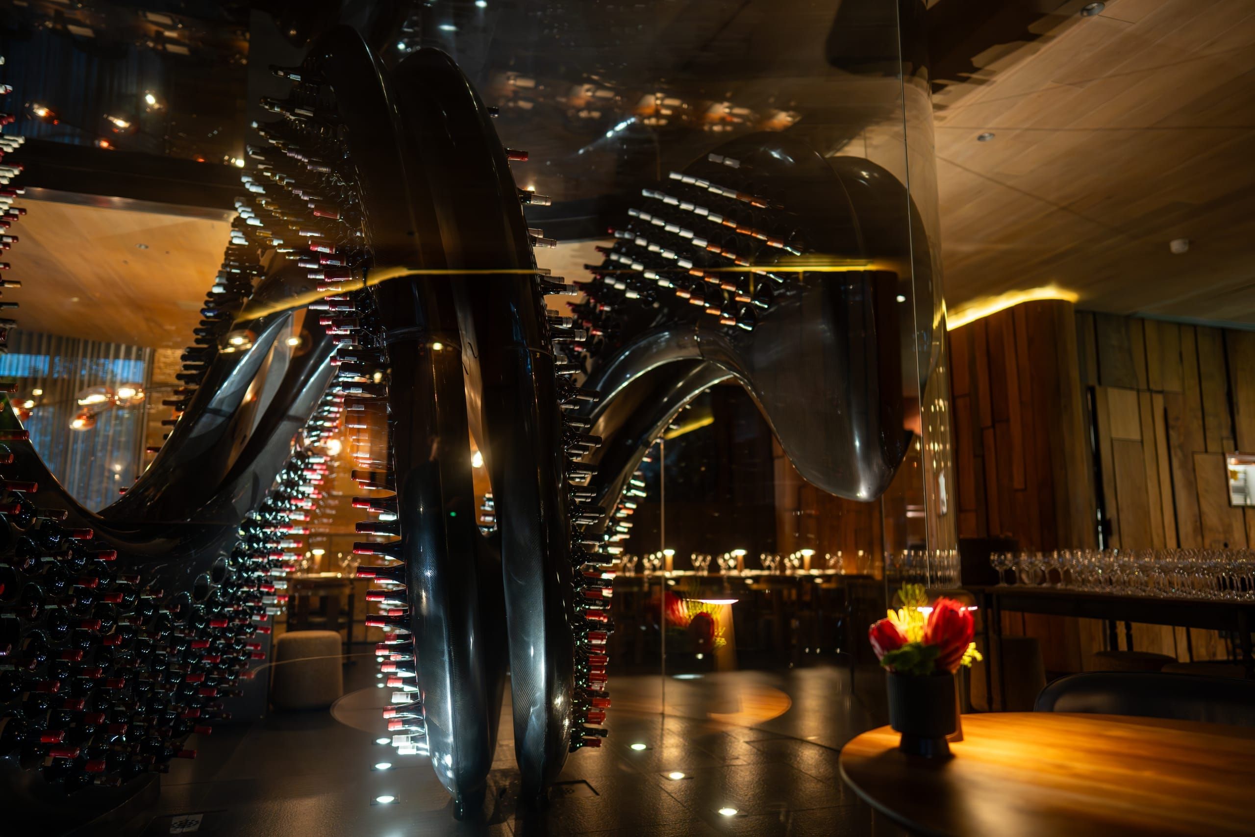 The sculptural wine gallery at Ellerman House, bottles spiralling through a darkened cellar