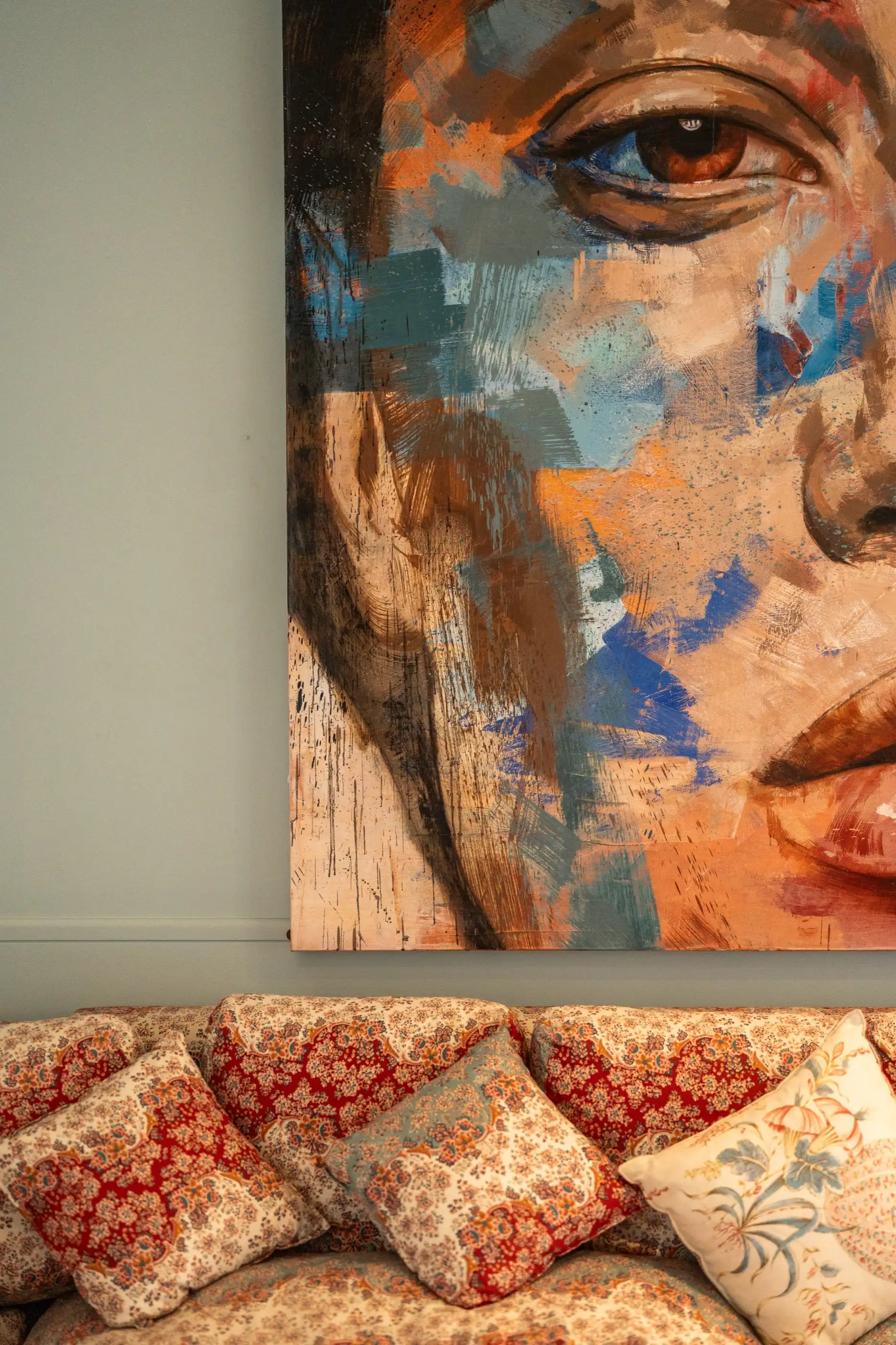An abstract portrait in oils hung in the gallery