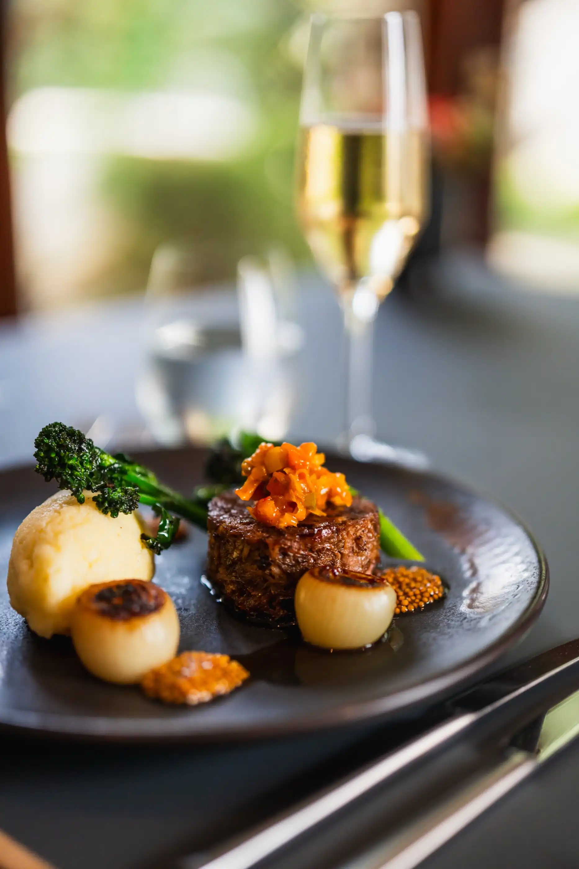 Fillet of beef plated with a glossy reduction