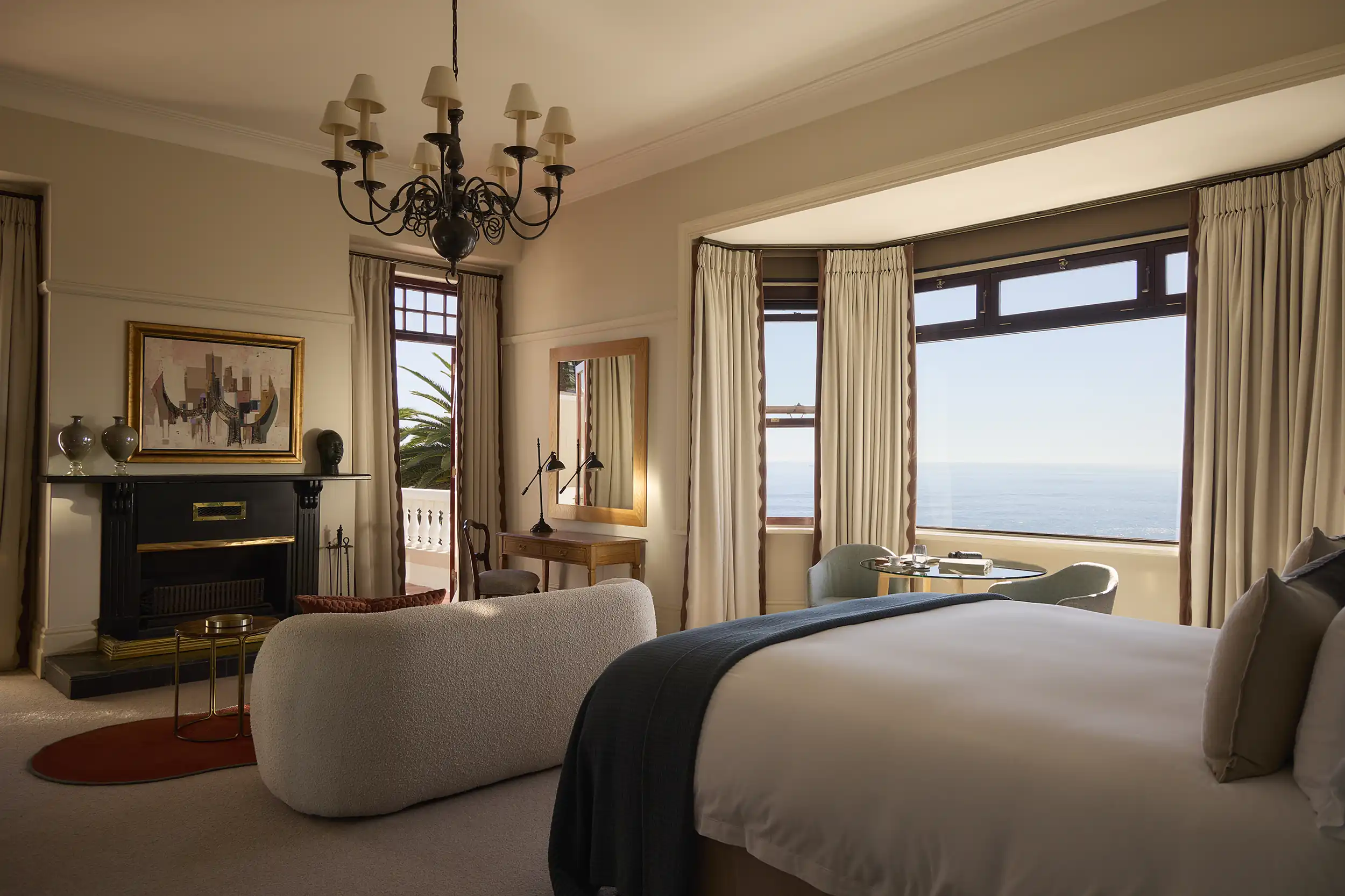 A sea-view suite with an open fireplace and curated art