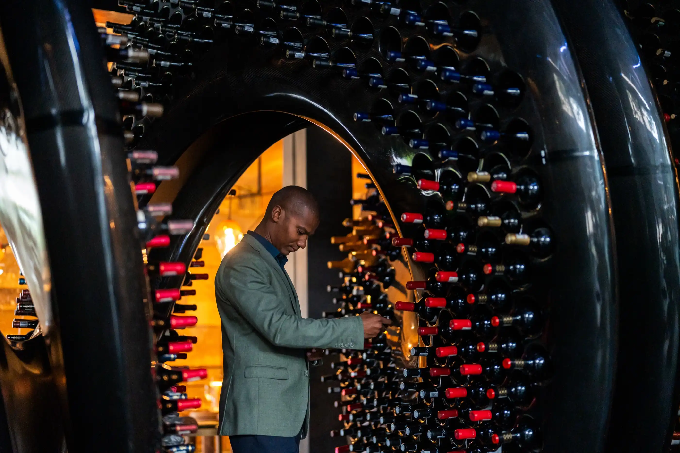 The sommelier walking the tunnel of the Ellerman House wine cellar