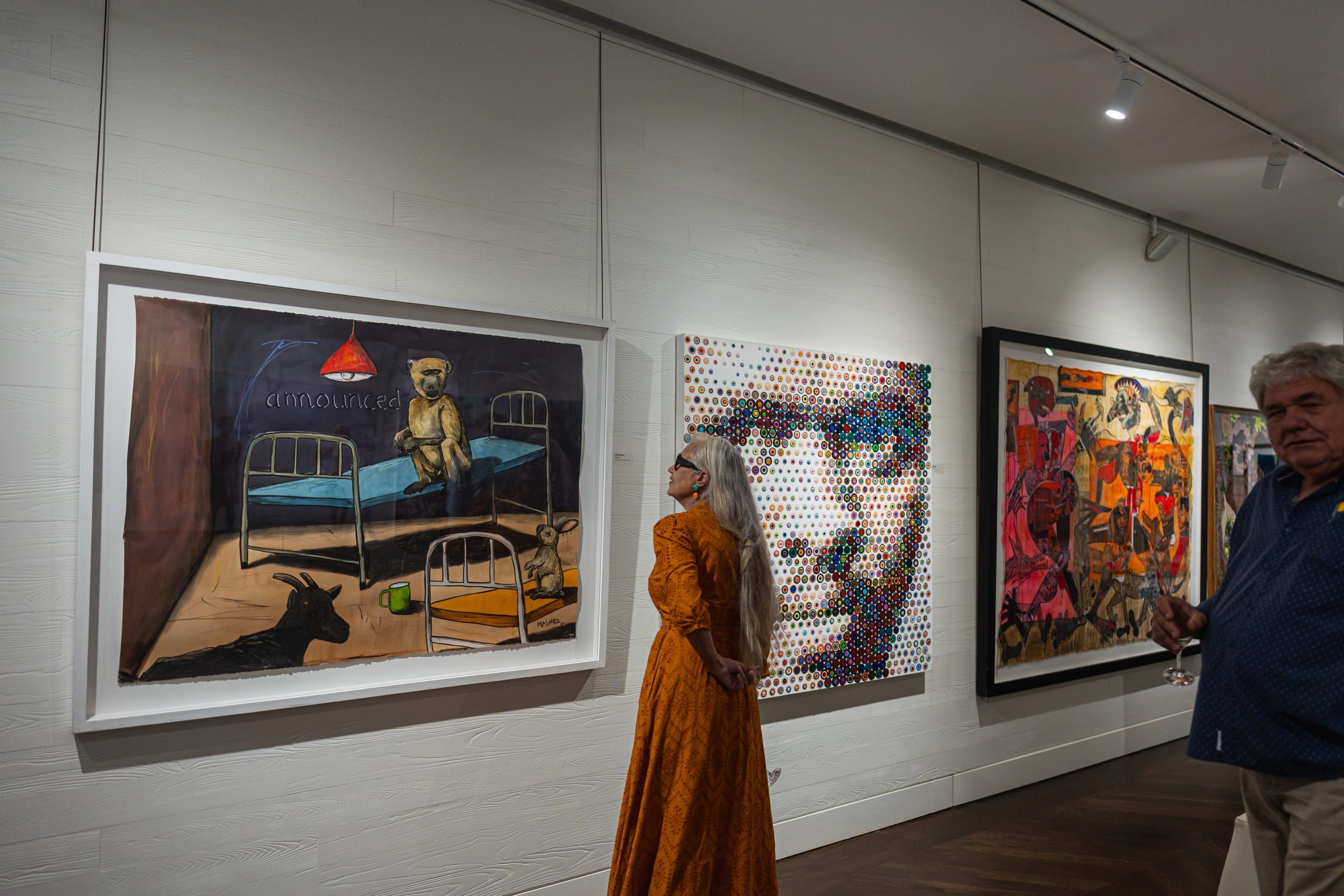Guests viewing artworks in the Ellerman House gallery