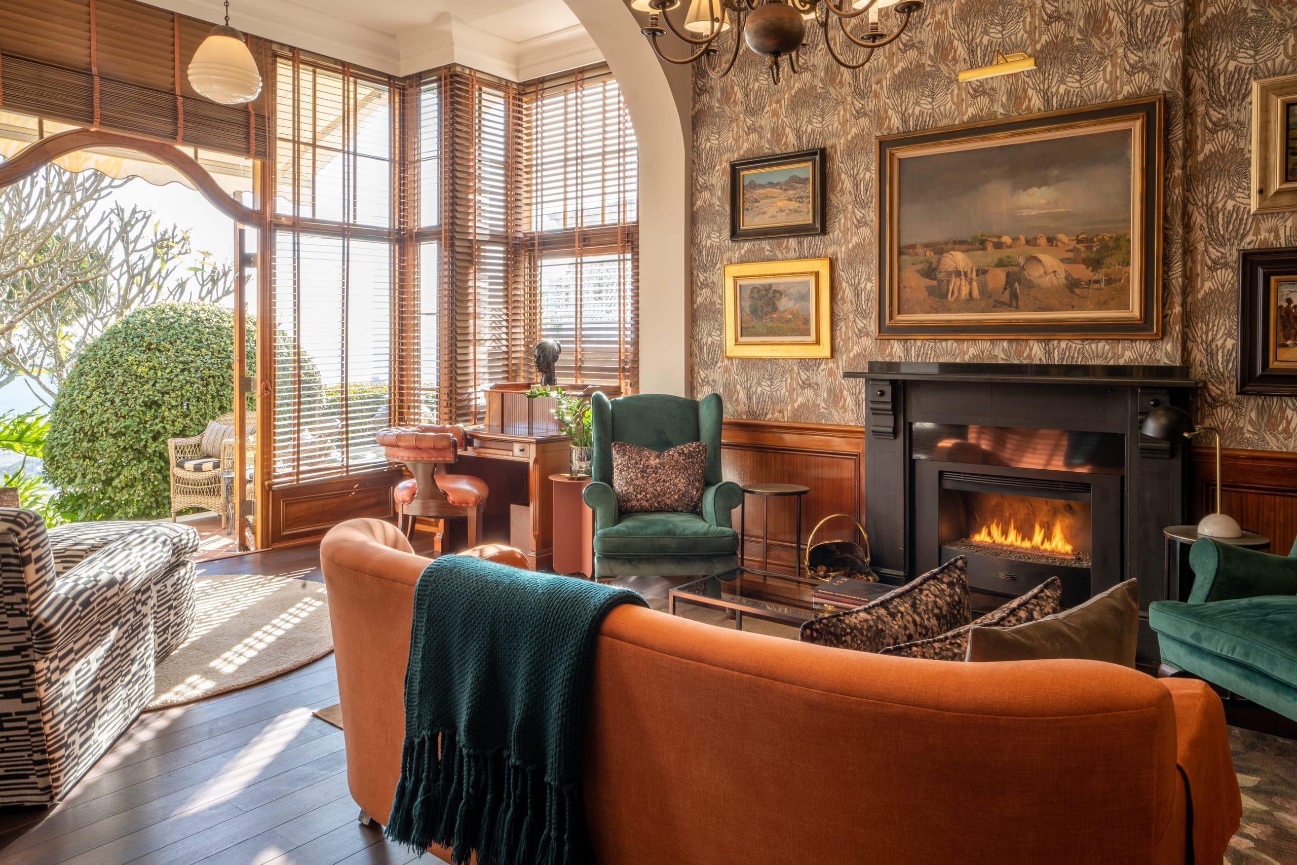 Fireside lounge with original South African art at Ellerman House