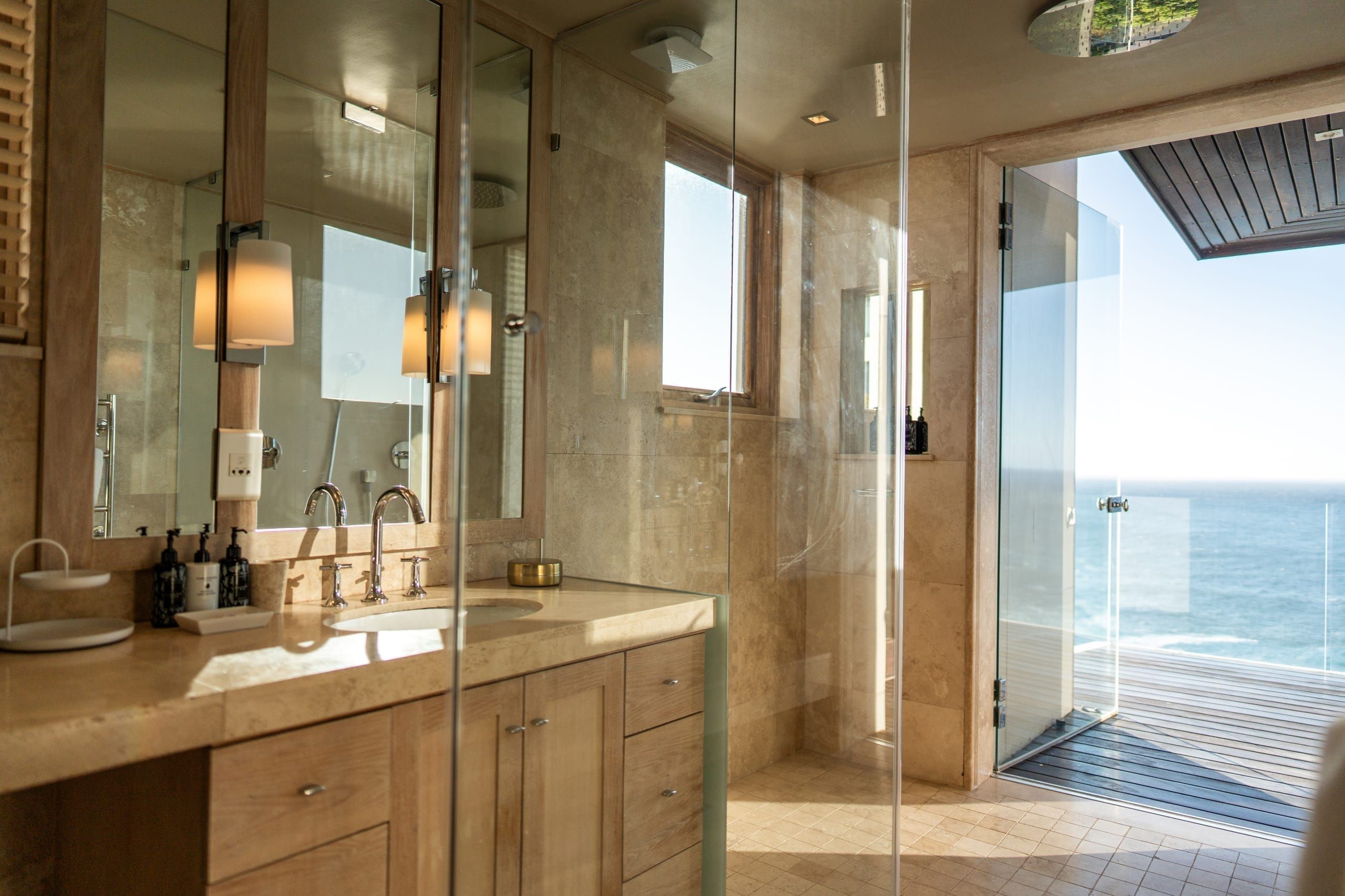 Villa bathroom with floor-to-ceiling windows