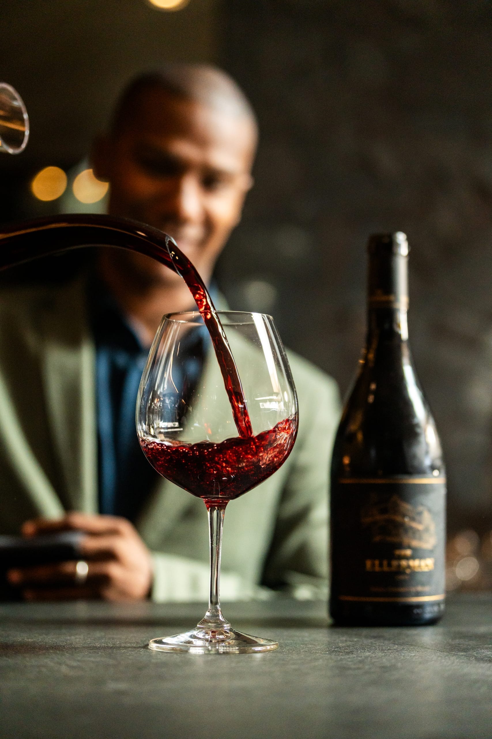 Red wine being poured into a glass