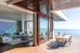 Bedroom with dining area on balcony